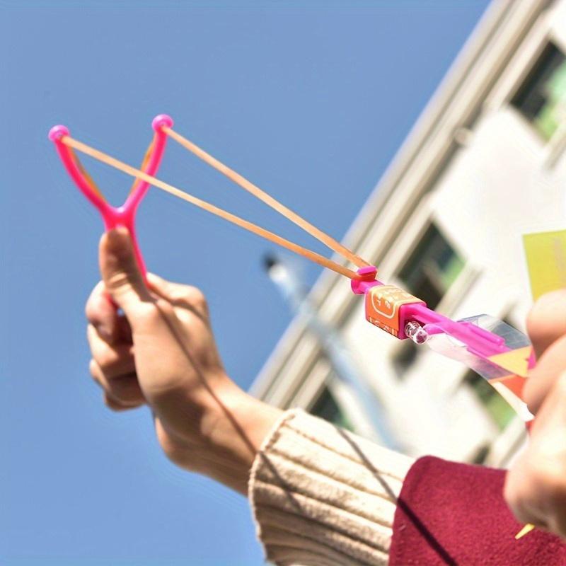 10pcs Glittering LED Rocket Slingshot Toys - Luminous, Elastic, Spinning, and Stocking Stuffer Friendly - Perfect for Carnival Prizes, School Classroom Rewards, and Halloween Christmas Gifts